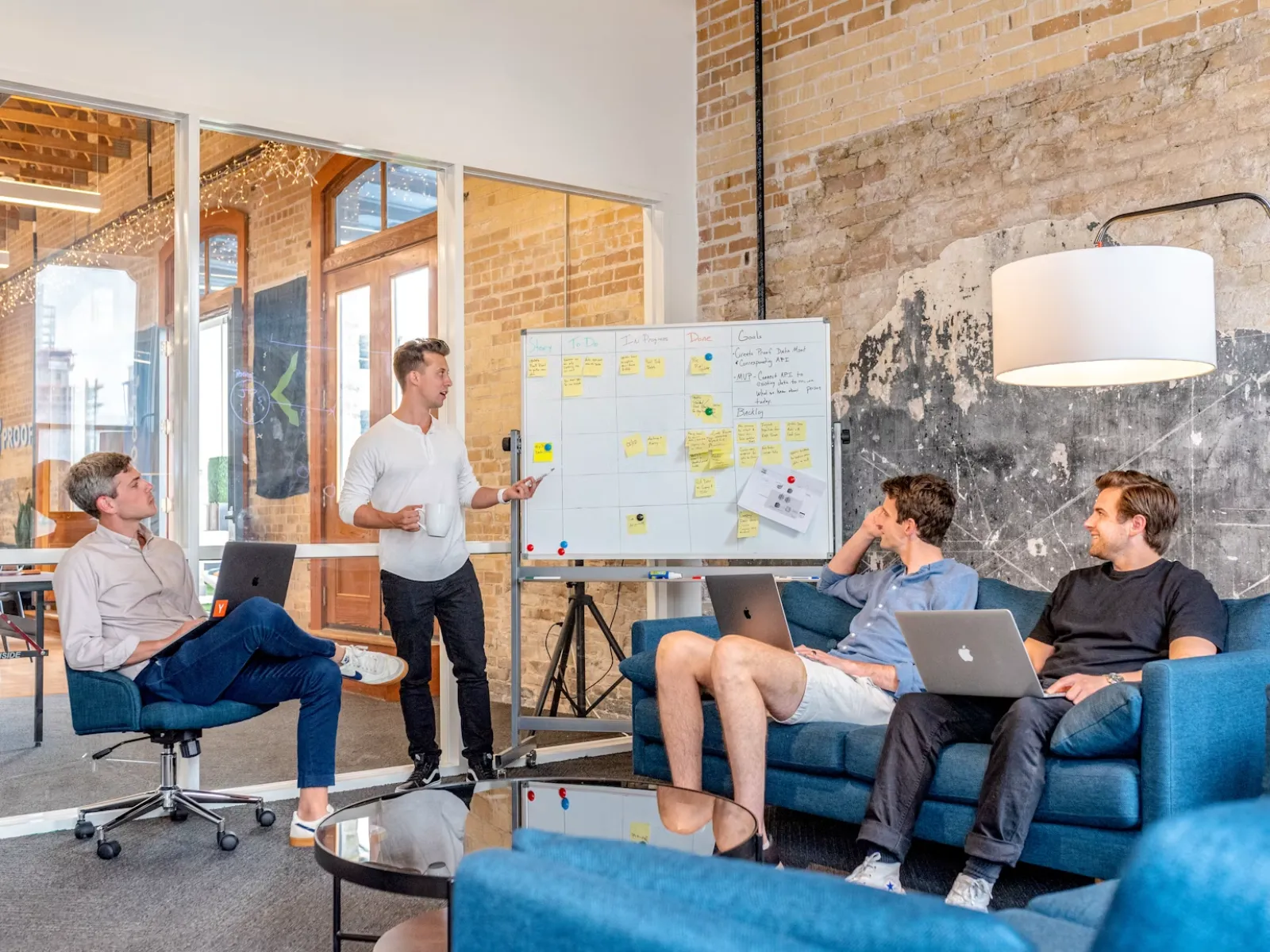 Two IT professionals collaborating in a modern office
